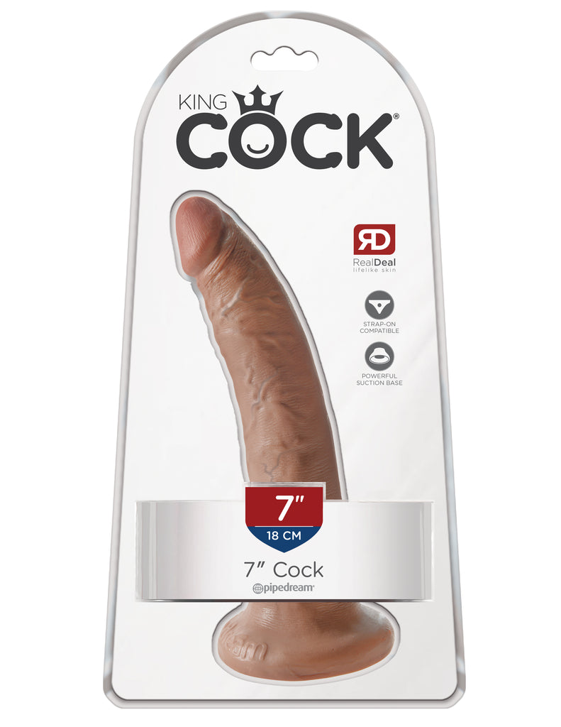 This is an image of The King Cock¬ 7" Cock - Tan. . Do you want your first dildo to look and feel just like the rock-hard stud you've always fantasized about? Stop dreaming and get down with the King! Every vein, every shaft, and every head is carefully handcrafted with exquisite detail to give you the most realistic experience ever imagined.