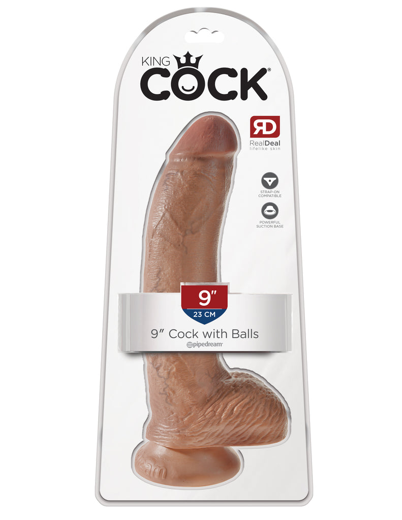 This is an image of The King Cock¬ 9" Cock with Balls - Tan. . Do you want your first dildo to look and feel just like the rock-hard stud you've always fantasized about? Stop dreaming and get down with the King! Every vein, every shaft, and every head is carefully handcrafted with exquisite detail to give you the most realistic experience ever imagined.