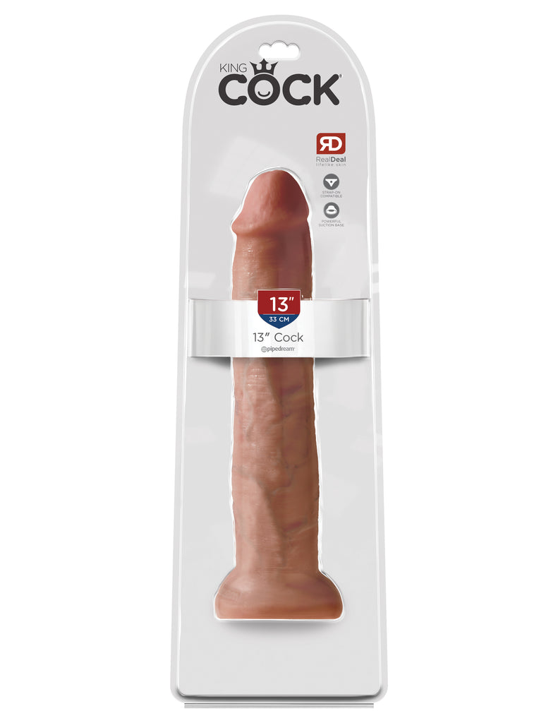 This is an image of The King Cock¬ 13" Cock - Tan. . Do you want your first dildo to look and feel just like the rock-hard stud you've always fantasized about? Stop dreaming and get down with the King! Every vein, every shaft, and every head is carefully handcrafted with exquisite detail to give you the most realistic experience ever imagined.