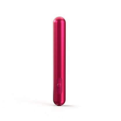 A slim, pink Chroma™ bullet vibrator by JIMMYJANE® with button controls stands upright on a white background, highlighting its waterproof design.