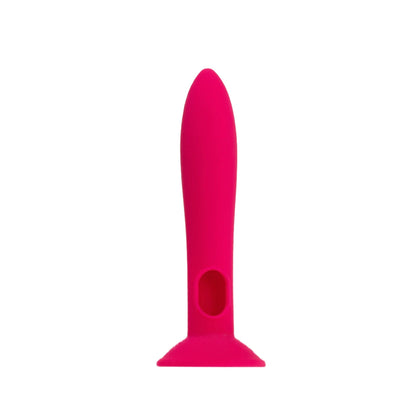 The JIMMYJANE® Chroma™Sleeve 1 is a bright pink waterproof silicone accessory with a rounded top, flat base, circular hole near the bottom, and a hands-free suction cup for secure placement. Shown on a white background.