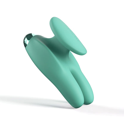 The JIMMYJANE® Form 2 Gripp™ is a teal, modern dual-pronged massager made from flexible silicone with a flat circular handle and multiple vibration modes, shown on a white background.