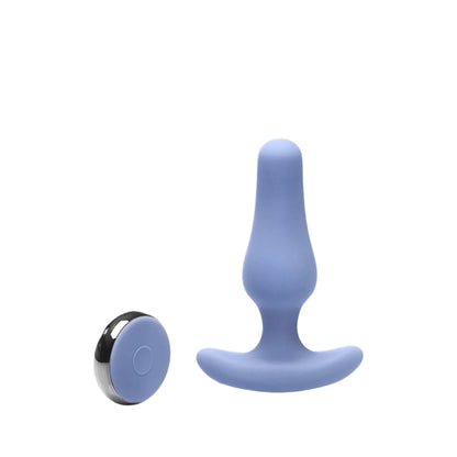 The JIMMYJANE® Dia® with Remote is a blue silicone vibrating plug with a curved base, featuring seven customizable vibration modes and a small, round black remote control.