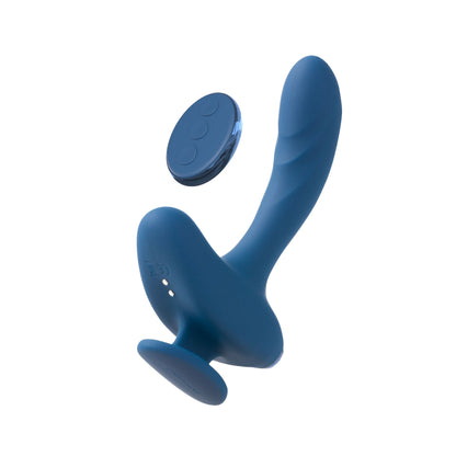 The JIMMYJANE® Solis™ Kyrios is a blue silicone prostate massager with a curved design and dual motors, shown with its round wireless remote on a white background.