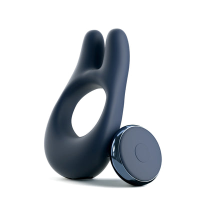 The JIMMYJANE® Deimos™ with Remote, a black vibrating silicone c-ring, is shown on a white background, designed to enhance couples’ play and deliver satisfying clitoral stimulation.