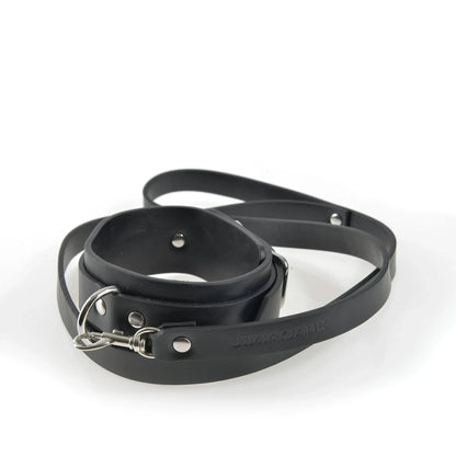 The JIMMYJANE® 7-Piece Bondage Set includes a sleek black vegan leather leash with metal clasp, ideal for enhancing couples experiences or as the perfect addition to your bondage kit.