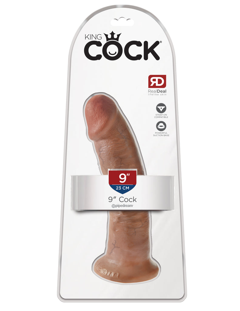 This is an image of The King Cock¬ 9" Cock - Tan. . Do you want your first dildo to look and feel just like the rock-hard stud you've always fantasized about? Stop dreaming and get down with the King! Every vein, every shaft, and every head is carefully handcrafted with exquisite detail to give you the most realistic experience ever imagined.