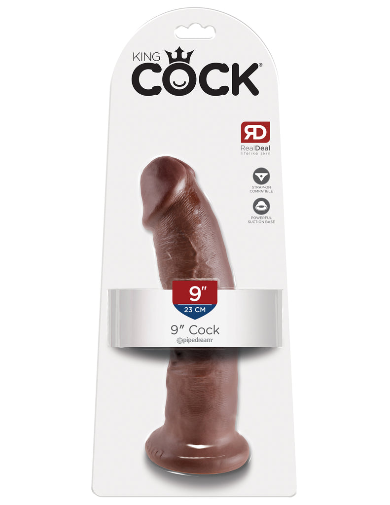 This is an image of The King Cock¬ 9" Cock - Brown. . Do you want your first dildo to look and feel just like the rock-hard stud you've always fantasized about? Stop dreaming and get down with the King! Every vein, every shaft, and every head is carefully handcrafted with exquisite detail to give you the most realistic experience ever imagined.