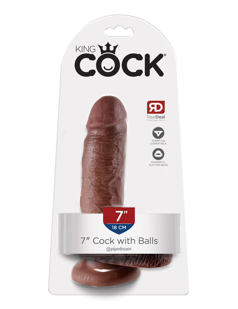 This is an image of The King Cock¬ 7" Cock with Balls - Brown. . Do you want your first dildo to look and feel just like the rock-hard stud you've always fantasized about? Stop dreaming and get down with the King! Every vein, every shaft, and every head is carefully handcrafted with exquisite detail to give you the most realistic experience ever imagined.