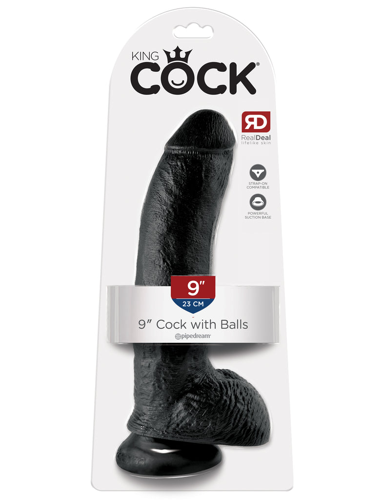This is an image of The King Cock¬ 9" Cock with Balls - Black. . Do you want your first dildo to look and feel just like the rock-hard stud you've always fantasized about? Stop dreaming and get down with the King! Every vein, every shaft, and every head is carefully handcrafted with exquisite detail to give you the most realistic experience ever imagined.