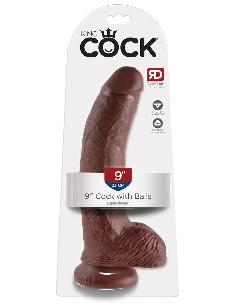 This is an image of The King Cock¬ 9" Cock with Balls - Brown. . Do you want your first dildo to look and feel just like the rock-hard stud you've always fantasized about? Stop dreaming and get down with the King! Every vein, every shaft, and every head is carefully handcrafted with exquisite detail to give you the most realistic experience ever imagined.