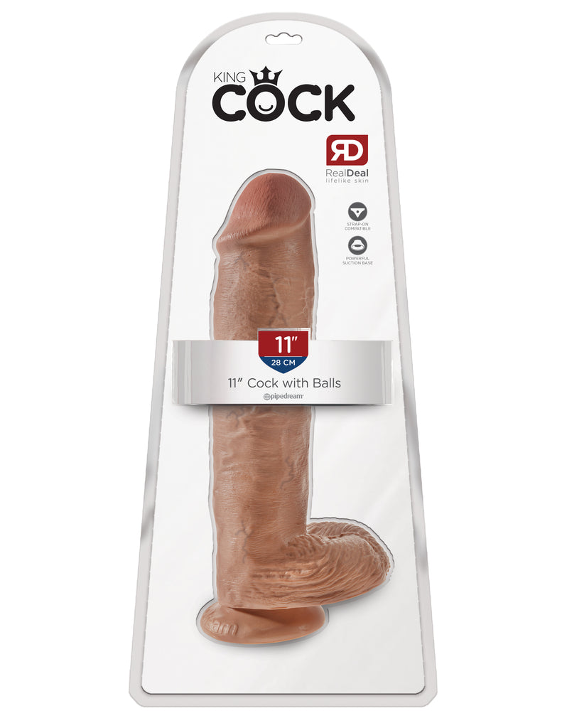 This is an image of The King Cock¬ 11" Cock with Balls - Tan. . Do you want your first dildo to look and feel just like the rock-hard stud you've always fantasized about? Stop dreaming and get down with the King! Every vein, every shaft, and every head is carefully handcrafted with exquisite detail to give you the most realistic experience ever imagined.