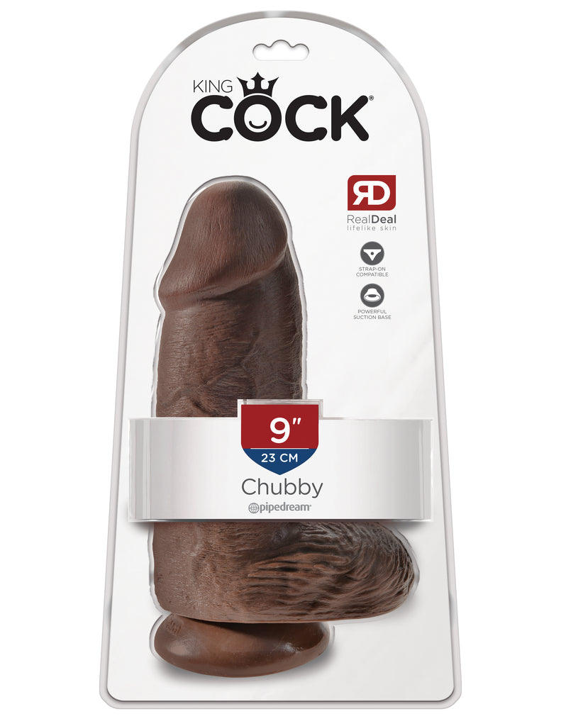 This is an image of The King Cock¬ 9" Chubby Brown. . Do you want your first dildo to look and feel just like the rock-hard stud you've always fantasized about? Stop dreaming and get down with the King! Every vein, every shaft, and every head is carefully handcrafted with exquisite detail to give you the most realistic experience ever imagined.